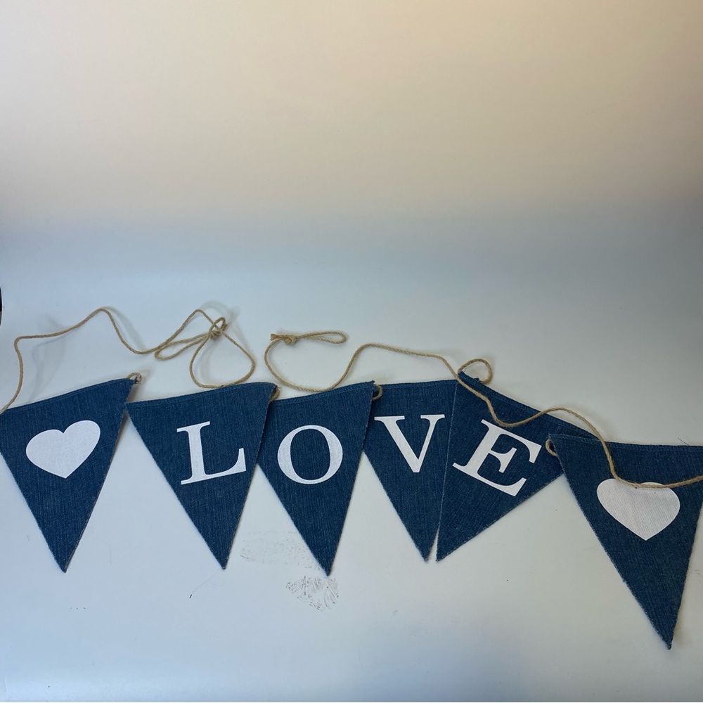 Denim banner with hearts and the letters LOVE printed in white